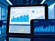"Smart investing dashboard showing robo-advisor portfolio performance with AI-driven financial graphs on digital devices"